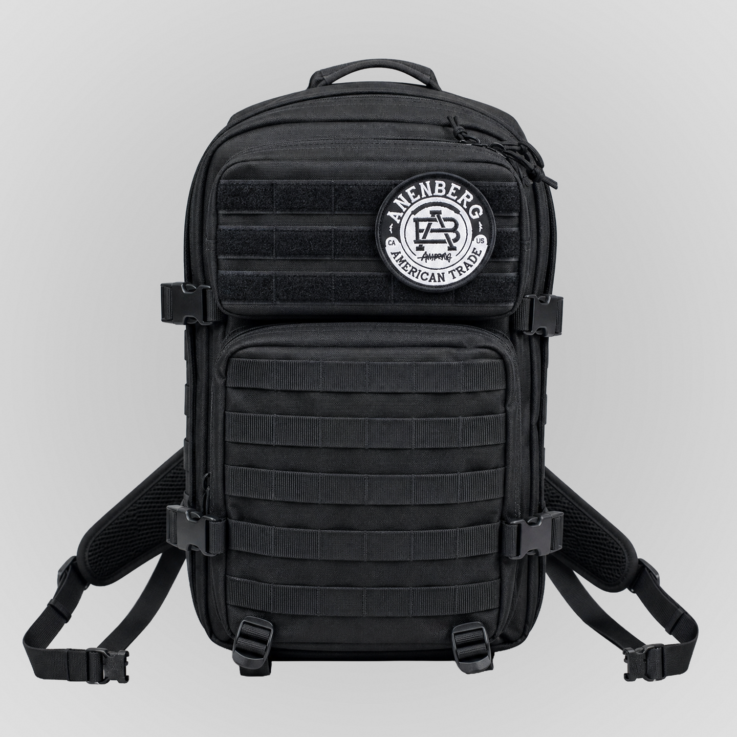 Front view of the Anenberg Black Out Pack Out Tactical Backpack featuring an all-black rugged design, multiple zippered storage compartments, MOLLE webbing, adjustable compression straps, and heavy-duty side-release buckles. A removable black-and-white Anenberg American Trade circular crest patch with the signature AB monogram accents the upper hook-and-loop panel. Padded shoulder straps, reinforced stitching, and tactical-inspired construction complete this versatile everyday carry backpack